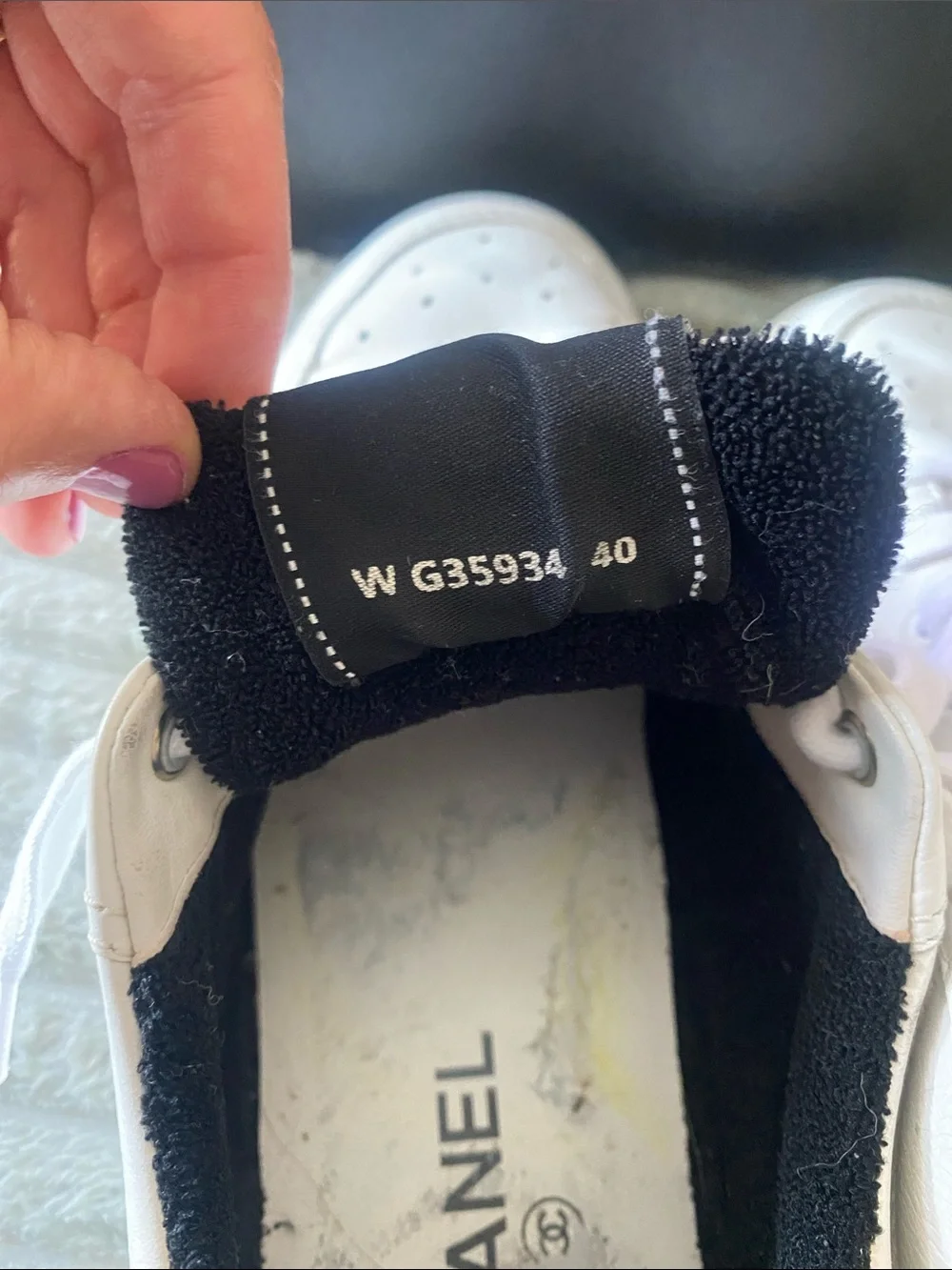 CHANEL White Leather Womens Low-Top Sneakers with Black Accents